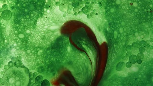 Red Droplets Dispersed In Green Liquid. Concept Of Organism Cells, Macro Abstraction.