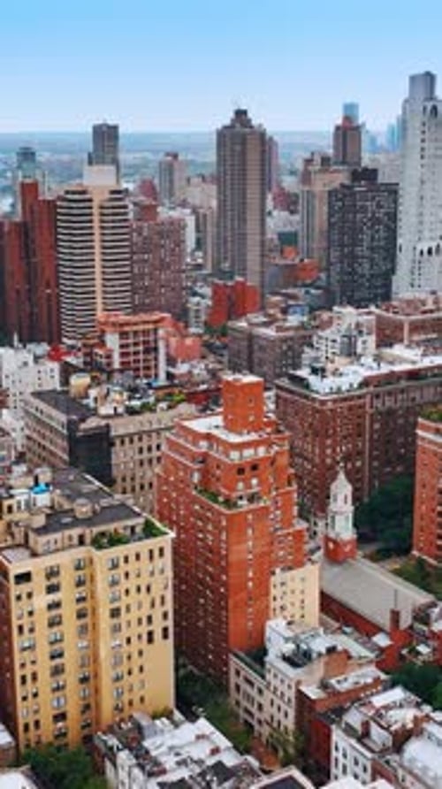 Colorful bright cityscape of New York. Drone footage above the metropolis panorama at daytime.
