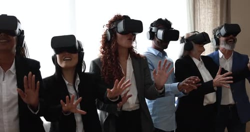 Multiracial Teamwork Having Fun Wearing Augmented Reality Headset Inside Business Office - Metaverse