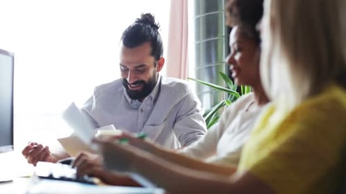 Collaborative Team Meeting in Bright Modern Office