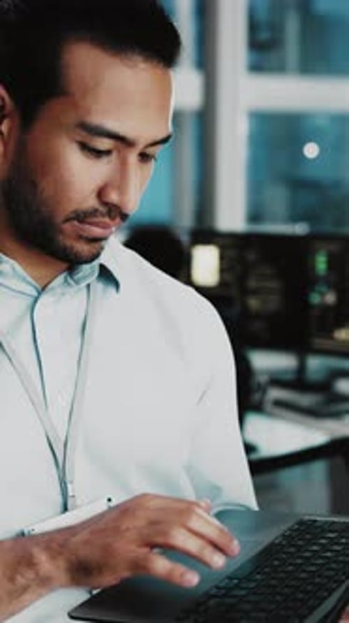 Business, programming and man in office, laptop for software development and website coding