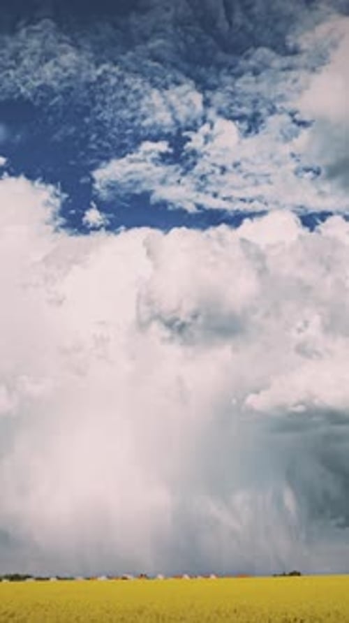 Stormy Clouds Over Rural Field