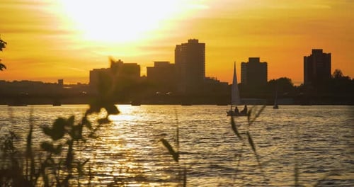 Boston City Skyline Over the Water, Sunset America