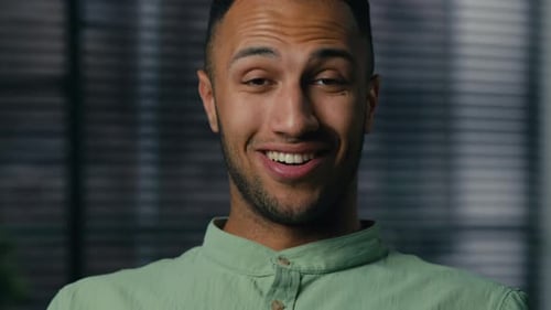 Man Smiling with Surprise Indoors Close Up