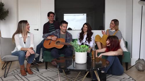 Friends Enjoying Music Together at Home