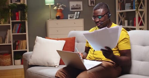 Man Working from Home on Video Call