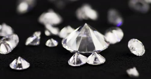 Sparkling Diamonds on Black Surface