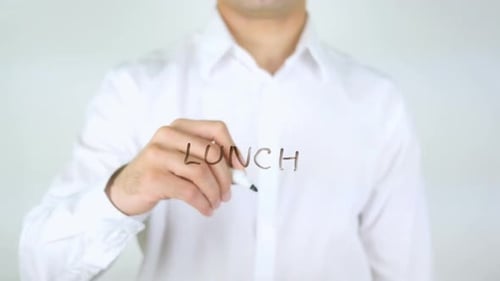 Writing the Word Lunch on a Clear Surface