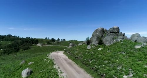 Rally truck in dirt road on mountains. Adventure extreme off-road 4x4 rally truck speeding down a mo