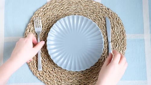 Setting the Table with Plate, Fork and Knife