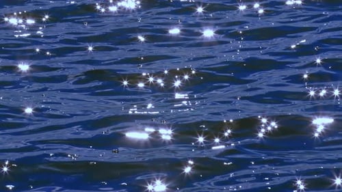 Sun Glitter Shining Above Navy Blue Sea Water