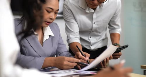 Young workers have brainstorm during business meeting in office