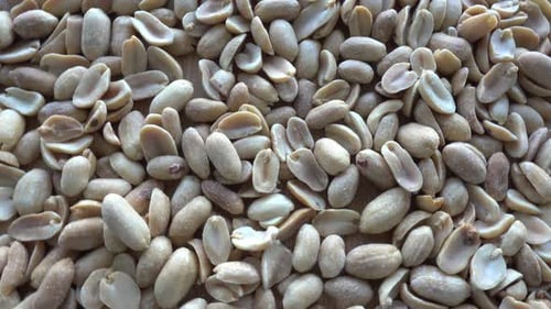salted roasted peanuts top view. snack to beer