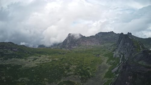Majestic Peaks and Heavenly Skies A Breathtaking Aerial View of CloudCapped Mountains