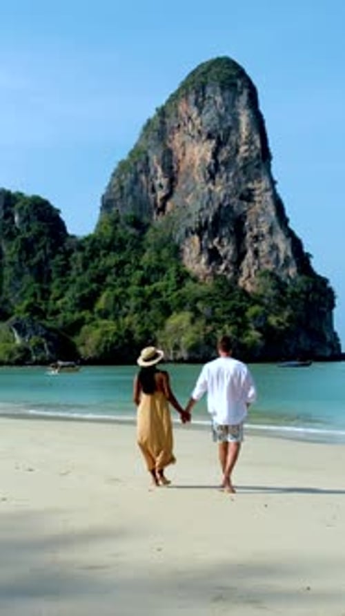 Strolling Hand in Hand Along the Pristine Beaches of Railay Krabi Thailand