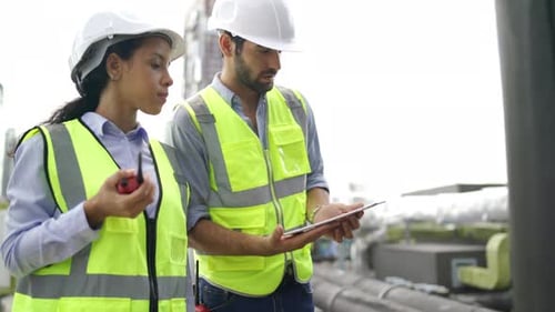 Professional engineer or technician worker man use tablet to explain the management system