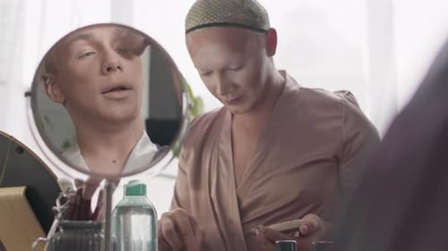 Queer Men Getting Ready for Drag Show Together in Backstage Room