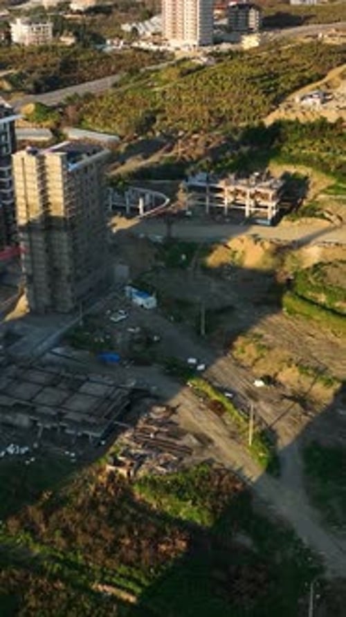 Vertical Video Above the Coastline Aerial View of a Coastal City on the Mediterranean
