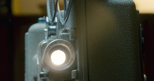 Bright Light Shines from Old Film Projector