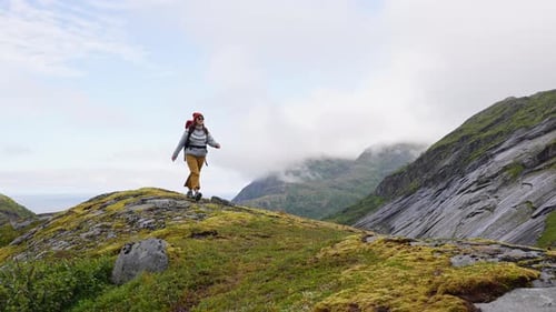 Woman Hiker Walking in Mountain Wilderness