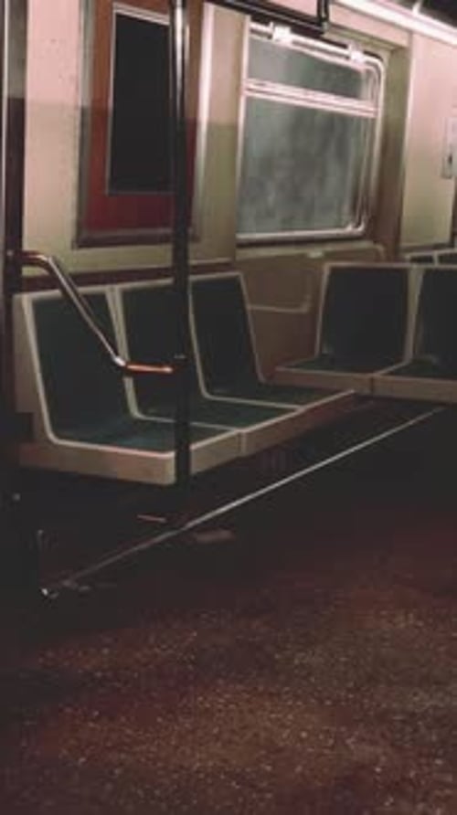 An Empty Train Car Waiting at a Metro Station