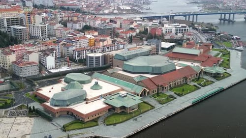 Halic Congress Center and Golden Horn Bridge zoom-out shot
