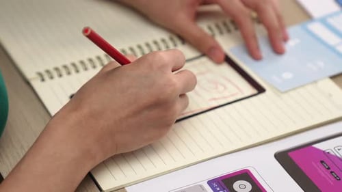 UX UI designer of startup company in workplace plan on user interface. Synergic