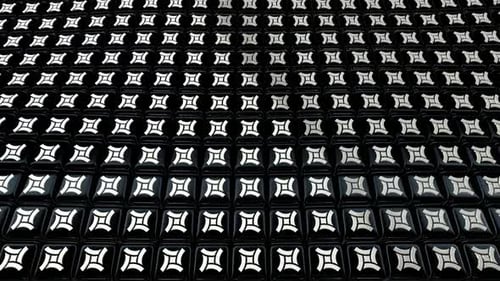 Looping Geometric Black Tile Pattern with Shimmering Abstract Shapes