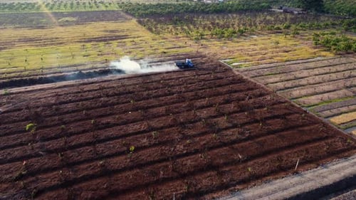 Aerial view of heavy earthmovers in construction site.
