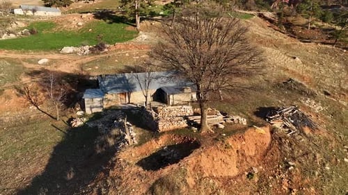 Old Village House on the River Bank Aerial View Beautiful Sunset Light