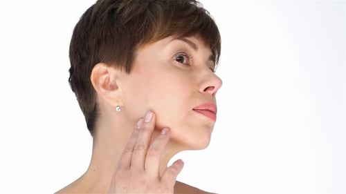 Close-Up of Woman Touching Her Face