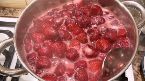 Strawberries Stirred in a Pot on Stove