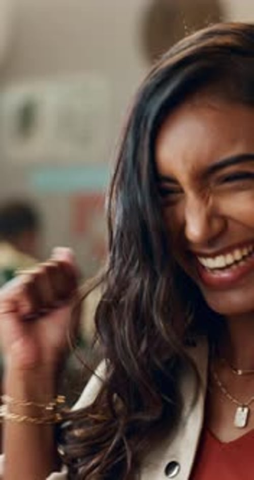 Woman, laptop and celebrate for win, success and smile for target goal, happiness and face