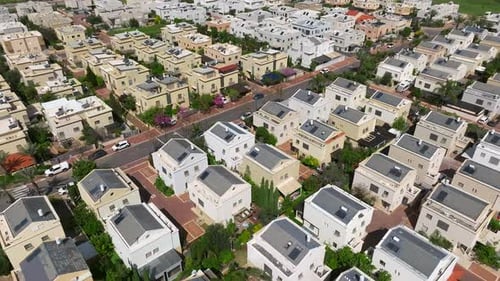 Suburban neighborhood homes with small private yards, typical middle class housing, Aerial view