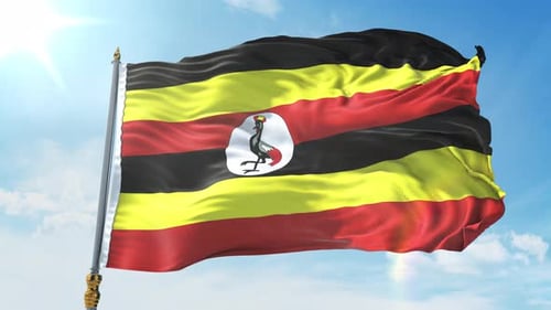 Uganda National Flag Waving in Realistic Blue Sky