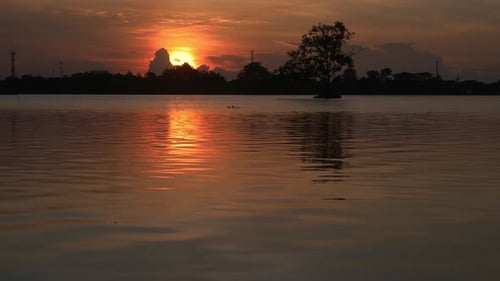 4K timelapse sunset on the lake.