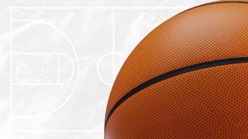 Game Time Collection: A background element of closeup of a basket ball rotating on a white stop moti