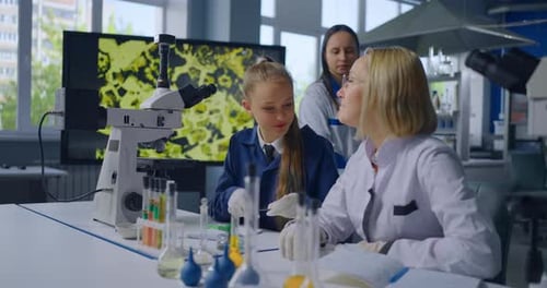 Young Girl Working on Science Project in Laboratory