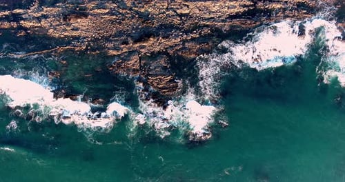 Waves crashing on coast line