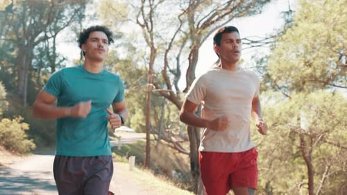 Men, running and friends at park, fitness and path in nature, training and workout for wellness