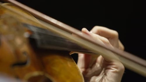 Close Up of Violin being Played With Bow