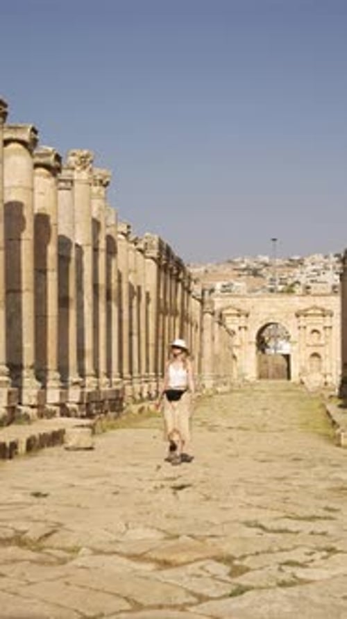 Vertical shot of ancient Roman ruins of Jerash at Cardo Maximus colonnaded street with a fashioned