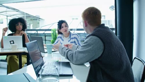 Team Meeting in a Modern Workplace