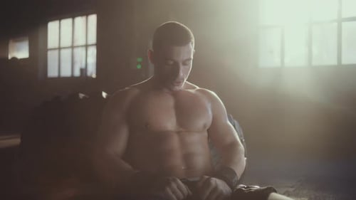Man breathing heavily after workout