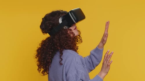 Woman Uses VR Headset with Hand Gestures