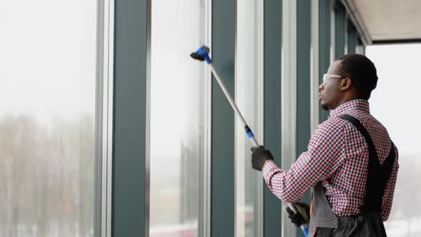 Professional Window Cleaner Man Washing Window Indoors, People Stock ...