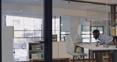 4k video footage of a handsome young businessman opening his office door