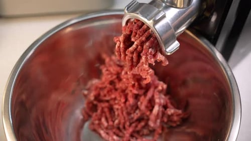 Electric Meat Grinder Processes Beef Into Minced
