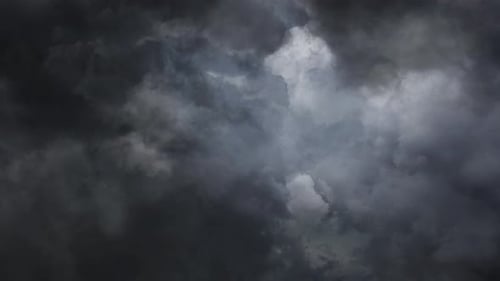 view of striking lightning bolts in dark clouds.