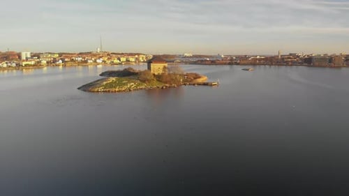 Aerial footage of Kruthuset a historical old building located in the ocean at Karlskrona, Sweden. I